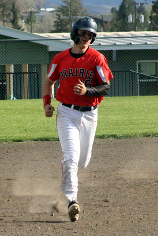 Chase Kaschmitter in his home run trot against Genesee in the game that clinched a state berth.