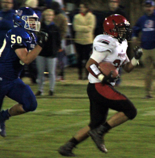 Brody Hasselstrom breaks loose for one of his two long touchdown runs at Genesee.