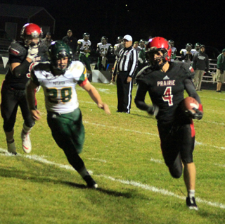 Derik Shears crosses the goal line for a 2-point conversion. At left is Dean Johnson.