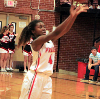 Madison Shears shoots for one of her six 3-pointers against Kamiah.