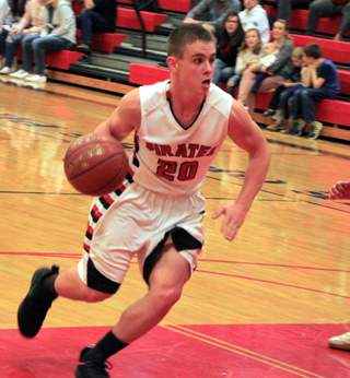 Owen Anderson drives into the lane against Kamiah.