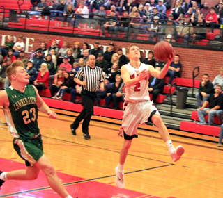 Cole Schlader goes for a transition lay-up for 2 of his game-high 25 points.