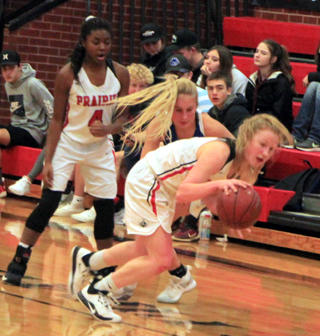 Kristin Wemhoff comes up with a steal against Orofino as Madison Shears watches.