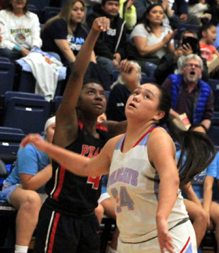 Madison Shears puts up a shot against Lapwai at District.