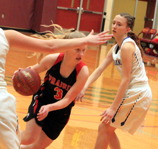 Kristin Wemhoff drives past a Raft River defender. She played some solid minutes off the bench for Prairie at State.