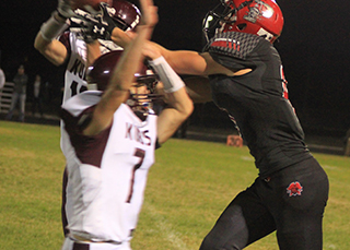 John  Gehring pulled the ball away from 2 Kamiah defenders for a big catch that set up Prairie’s first touchdown.