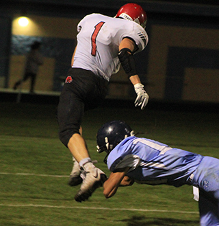 T.J. Hibbard leaves a Lapwai defender grasping air on a 37 yard scoring run.