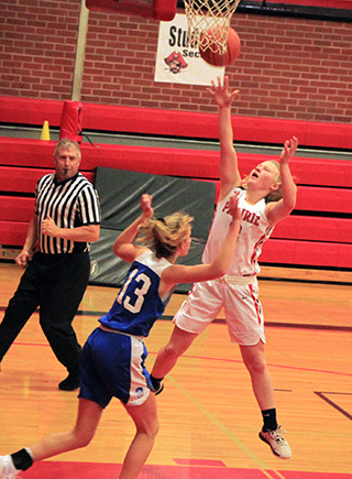 Kristin Wemhoff scores 2 of her game-high 20 against Orofino.