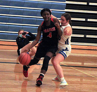 Madison Shears drives along the baseline at Genesee. She wound up scoring a lay-up on the play.