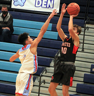 Zach Rambo shoots for 3 at Lapwai.