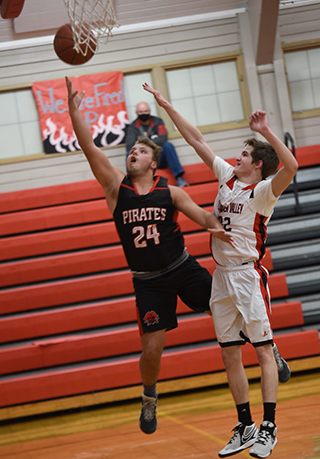 Brody Hasselstrom scores a lay-up at C.V. Photo by Shelley Schlader.