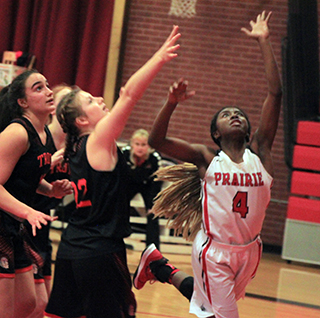 Madison Shears goes for a lay-up against Troy.