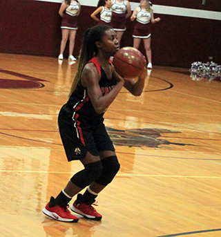 Madison Shears is about to make one of her five 3-pointers at Kamiah.