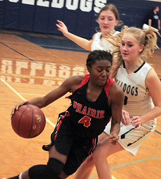 Madison Shears drives past a Grangeville defender.