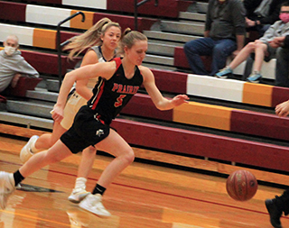 Ellea Uhlenkott chases down a loose ball in the Lighthouse Christian game.