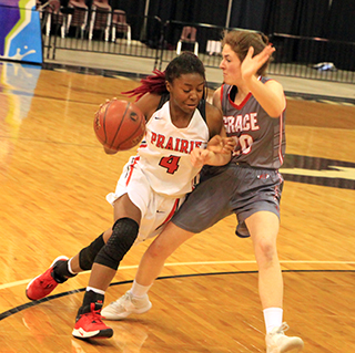 Madison Shears drives by a Grace defender in the championship game.