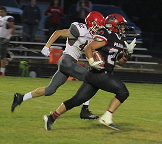 Brody Hasselstrom streaks past a C.V. defender on his 84-yard TD run that made it 14-0