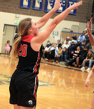 Molly Johnson shoots at Lapwai. She had a career high 9 points in the game and followed it up with 8 against Genesee.