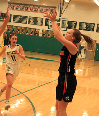 Delanie Lockett makes one of her four 3-pointers at Potlatch.