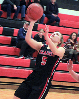 Delanie Lockett scores a lay-up at Troy.