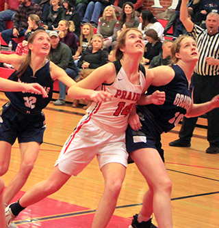 Tara Schlader battles for rebounding position against Grangeville’s Adaleigh Lefebvre. Also shown at left is Bailey Vanderwall, granddaughter of Cottonwood’s Gloria Funke.