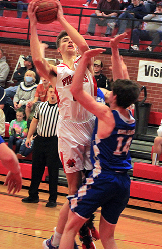 Zach Rambo goes for 2 of his game-high 31 points against Genesee. It was also his birthday.