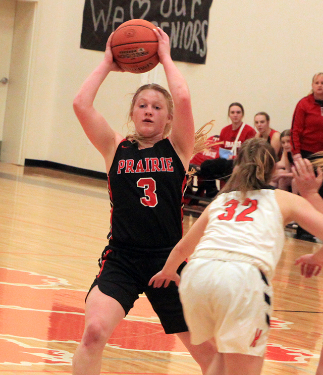 Kristin Wemhoff looks to pass at Kendrick.
