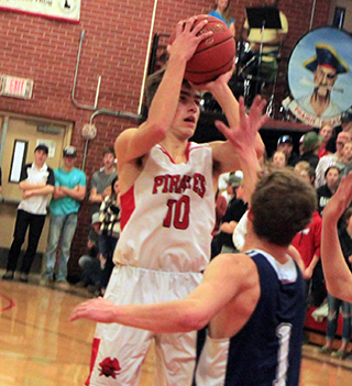 Zach Rambo puts up a shot against Grangeville on Senior Night. He scored the game-winner with 5 seconds left.