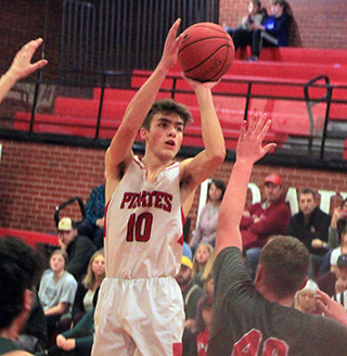 Zach Rambo shoots for 2 of his 32 points against C.V.