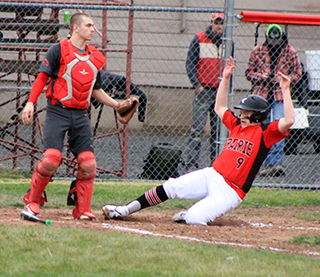 Noah Behler slides into home with the go-ahead run in Prairie’s game at C.V. He scored on a 2-run single by Dylan Uhlenkott that made it 4-3. Prairie went on to score 9 more runs in the inning to blow out the Rams 13-3.