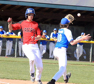 Reese Shears reaches first on an infield hit just before the throw arrives in the opening game.