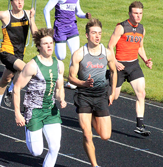 Zach Rambo in the 200 meter dash final which he won, edging the Potlatch runner to his right. He broke the school record in the event in the prelims on Friday. He also qualified for State in the 100, 400 and 4x100 relay.