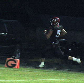 Trenton Lorentz is about to cross the goal line with one of his 4 touchdowns against Potlatch.