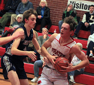 Lee Forsmann gathers himself to go up for a shot against Logos.