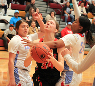 Kylie Schumacher gets fouled as she attempts to shoot against Lapwai.