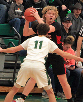 Noah Behler with the ball in the District opener at Potlatch.