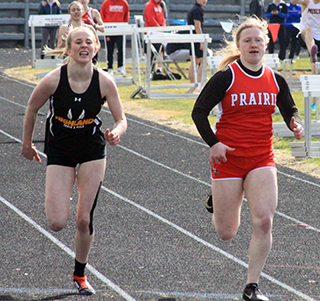 Kristin Wemhoff, right, won the 400 meter dash at the Lewiston Invitational in a personal best time of 59.44. The school record is 59.0.
