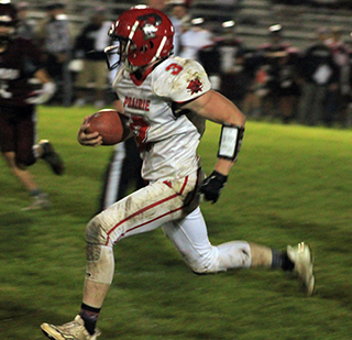 Dylan Uhlenkott found some open field and went 47 yards for Prairie’s first touchdown at Kamiah last Friday evening.