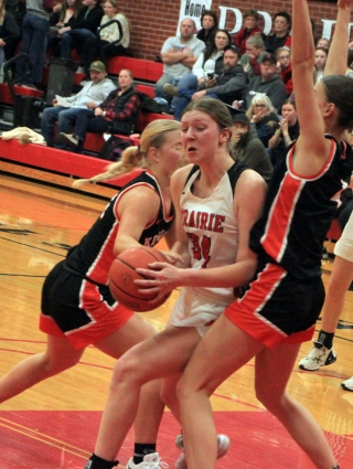 Kylie Schumacher battles in the paint against Kendrick’s posts.