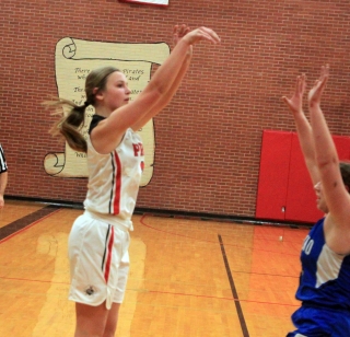 Lexi Schumacher shoots for 3 of her game-high 27 points against Orofino.
