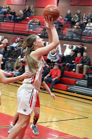 Kylie Schumacher scores against C.V.