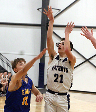 Cody Weckman puts up a shot against Salmon River.