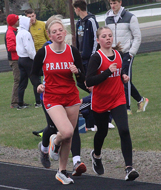 Ella McLeod and Faith Cash in the 3200 at the White Pine Meet.