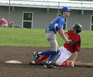 Phil Schwartz steals second in Prairie's 25-run first inning against Nezperce.