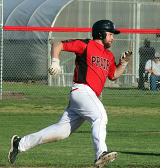 Jake Quintal rounds first on one of his two singles against C.V.