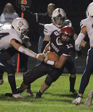 Chris Schumacher battled his way through several defenders to score Prairie’s first touchdown against Logos.