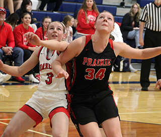 Kylie Schumacher battles for rebounding position against Oakley.