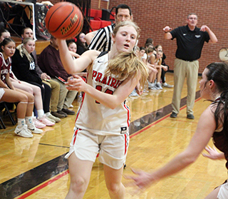 Erica Schlader makes a pass in the game against Kamiah.