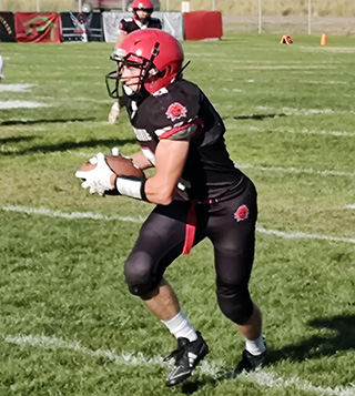 Cooper Riener on his way to his second touchdown against Valley.
