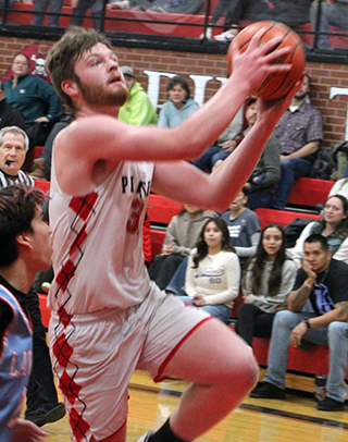 Nate Forsmann goes for a lay-up against Lapwai.